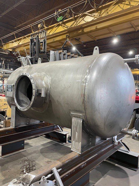 Custom-fabricated condensate tank by GSM Industrial, showcasing precision-welded nozzles and connections to meet strict ASME code requirements.