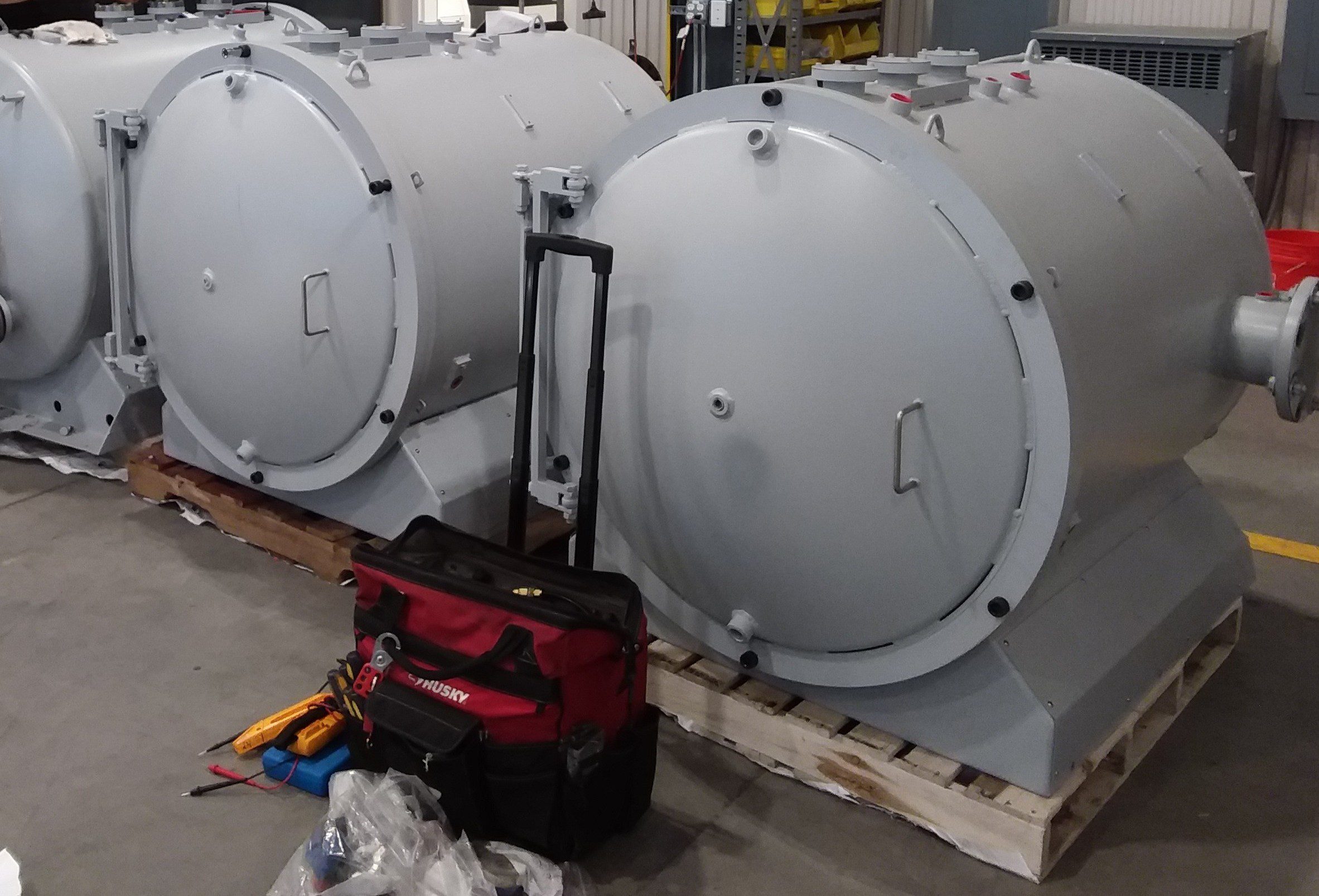 Three 304 stainless double-wall vacuum furnace chambers in the GSM Industrial shop, Lancaster PA, leak tested before shipment
