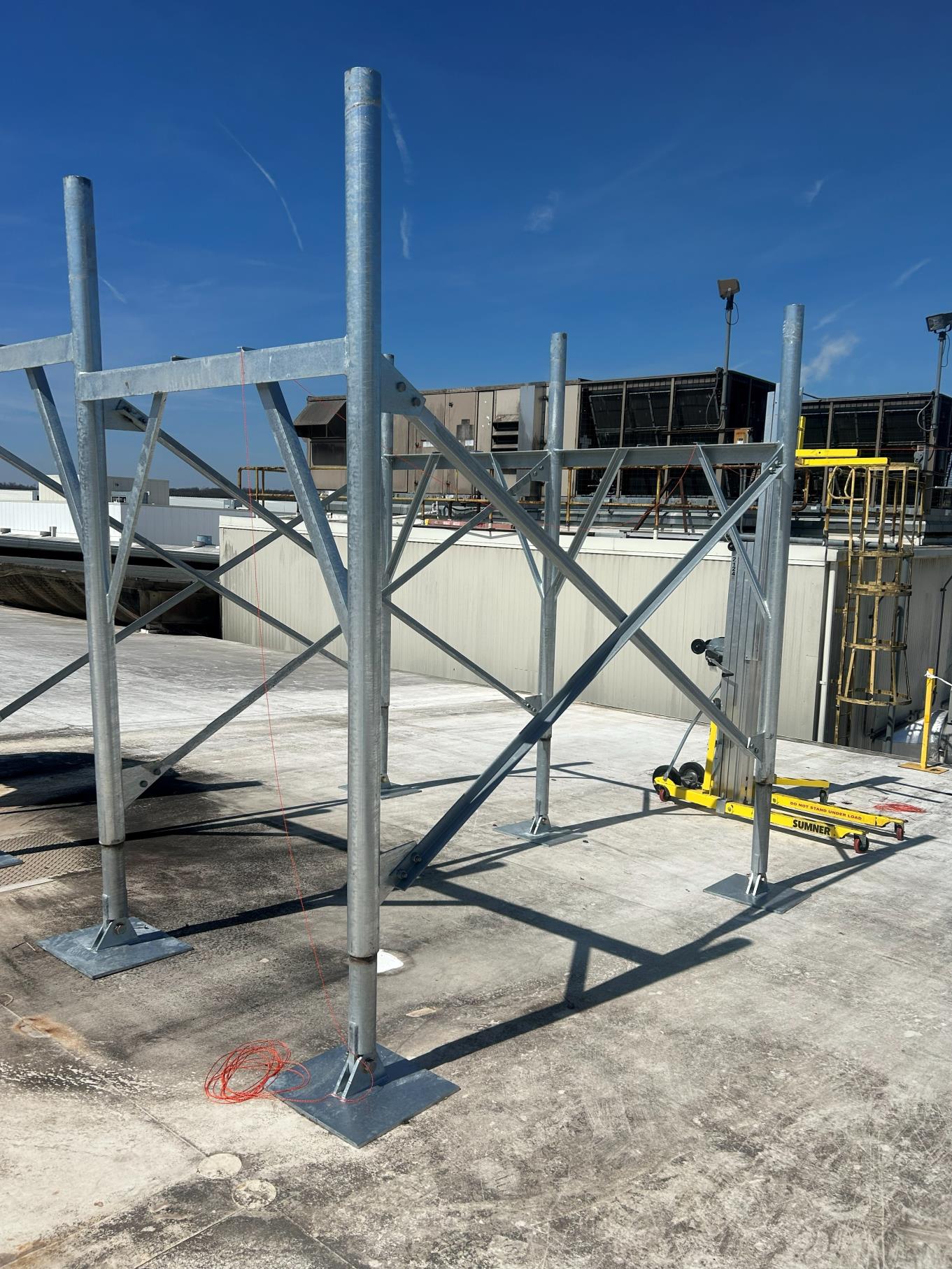 Hot-dip galvanized double duct support stand on an industrial roof in Bloomsburg PA